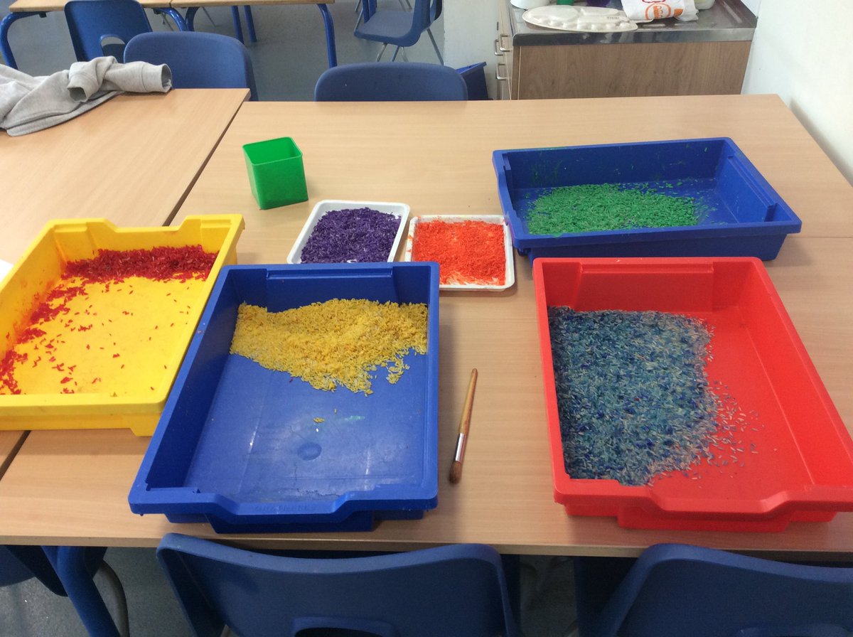 Another great day for our children attending school. The children dyed rice using food colouring. They left it in the sun to dry then they used rice and glitter to make pictures of various things. <a href="/SRA_art_/">SRA Art</a>