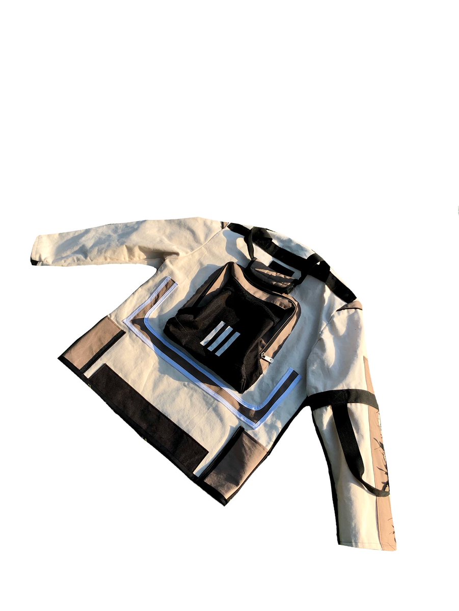 questionmarqo's tweet photo. Turned this @adidas duffle bag into a jacket! @adidasoriginals https://t.co/Jude4zC3ku