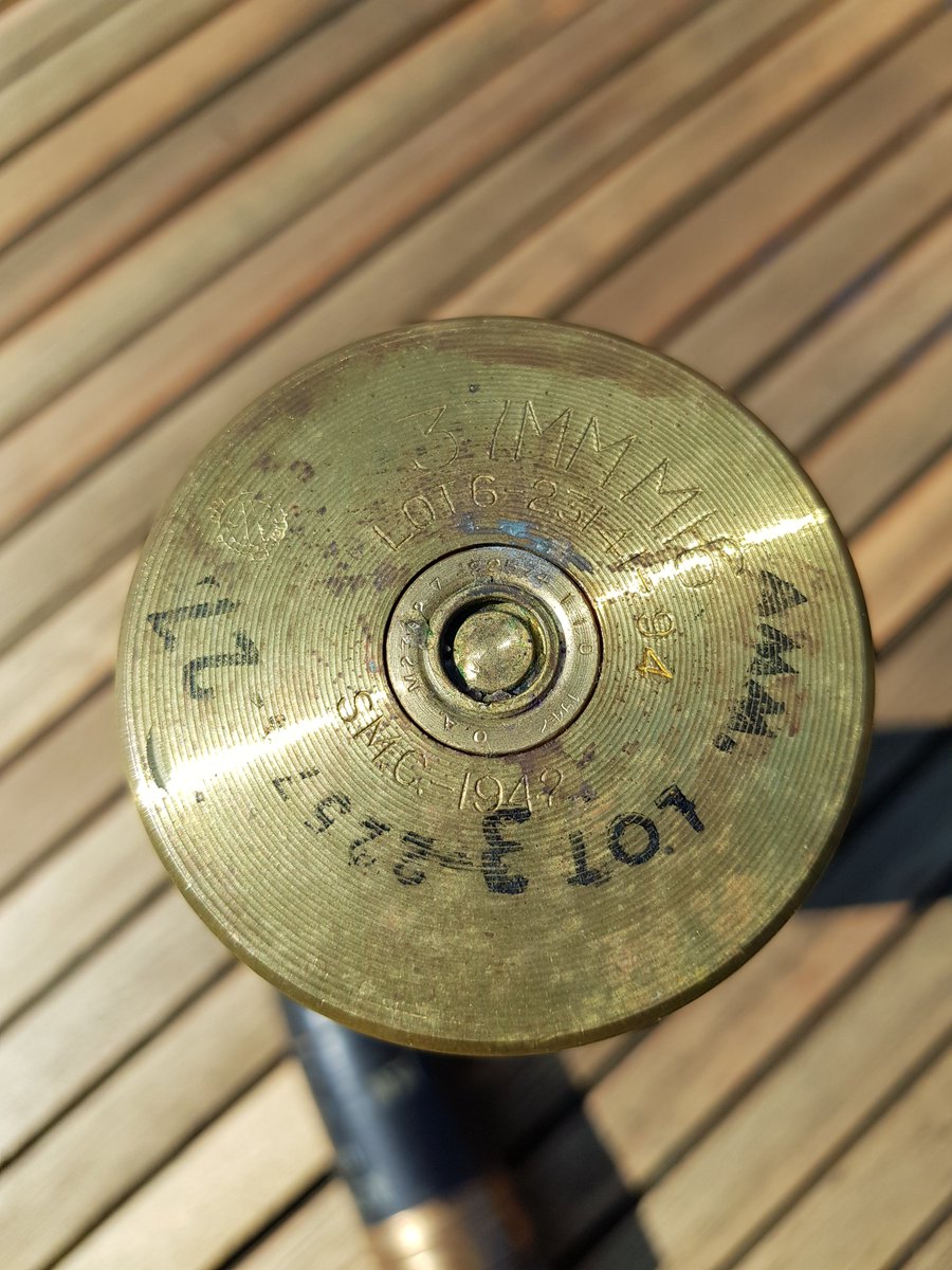 Today's #inertordnance picture is a US #WW2 #37mm M51B2 APCBC-T The projectile and brass case are both dated 1942, the paint and stencils are original. These were used in the Stuart Light Tank and M3 anti tank gun.