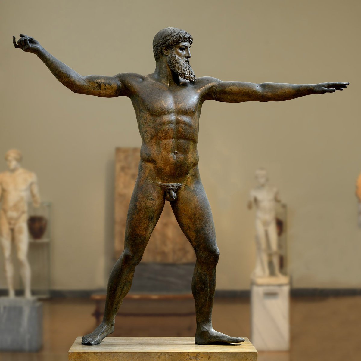 The perfect symmetry of the Zeus Artemision bronze.