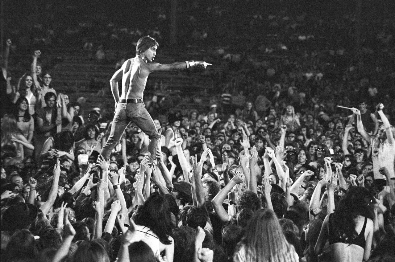 Happy 73rd birthday, Mr. Iggy Pop!
Now THAT\S crowd surfing.   Photograph by Tom Copi 