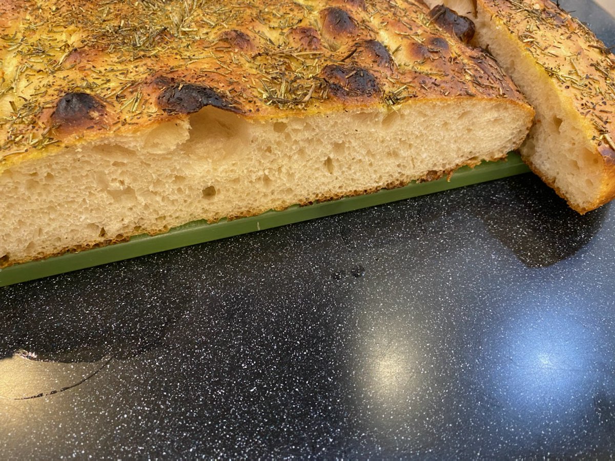 Crumb shot of the herby #sourdough focaccia bread - beautiful texture and flavorful crust. You can bake with sourdough culture instead of commercial yeast for tastier, more nutritious, &amp; more affordable artisan bread @ home. Wild Culture Sourdough Starters wild-culture.com