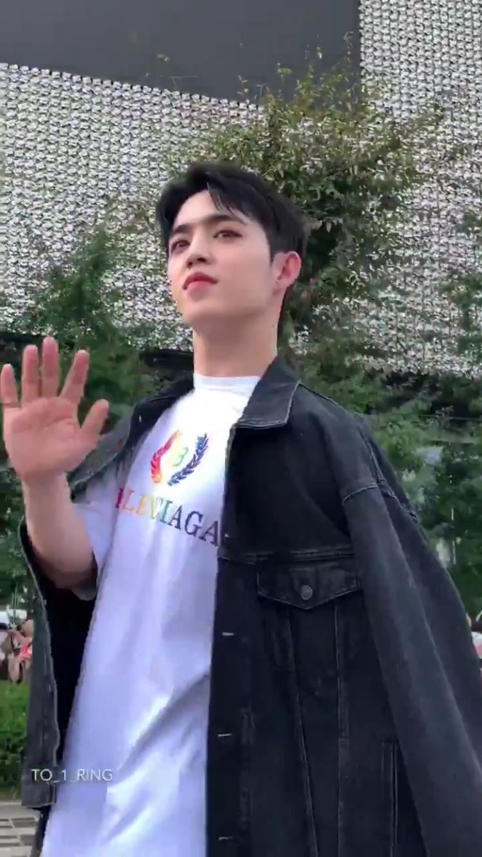 seungcheol wearing two pieces from balenciaga showing support for lgbt (jacket + shirt)