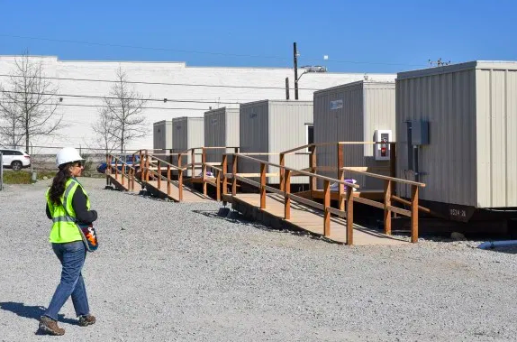 A King County worker inspects a quarantine site designed to provide a safe place for homeless individuals.