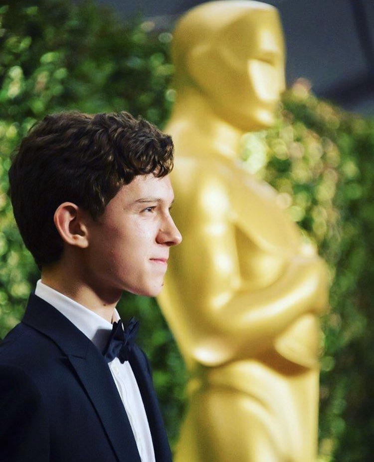 these are from the Academy of Motion Picture Arts and Sciences’ Governors Awards, but he’s next to an Oscar, so