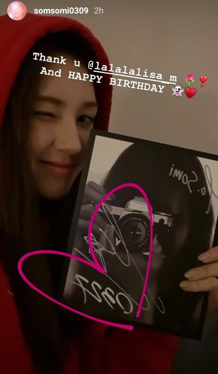 somi with lisa's signed photobook wishing her happy birthday