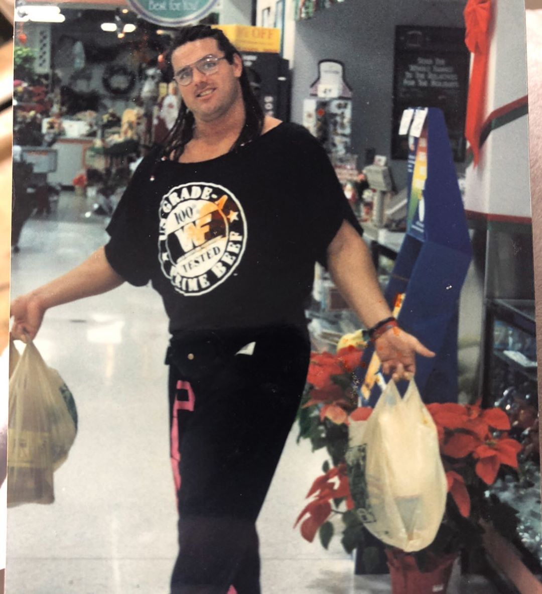 "Get the shopping in Dave." Bum bag, WWF promotional shirt, jogging bottoms. This is how you want to do your Christmas shopping. My favourite outfit out of the lot. The braids make it.