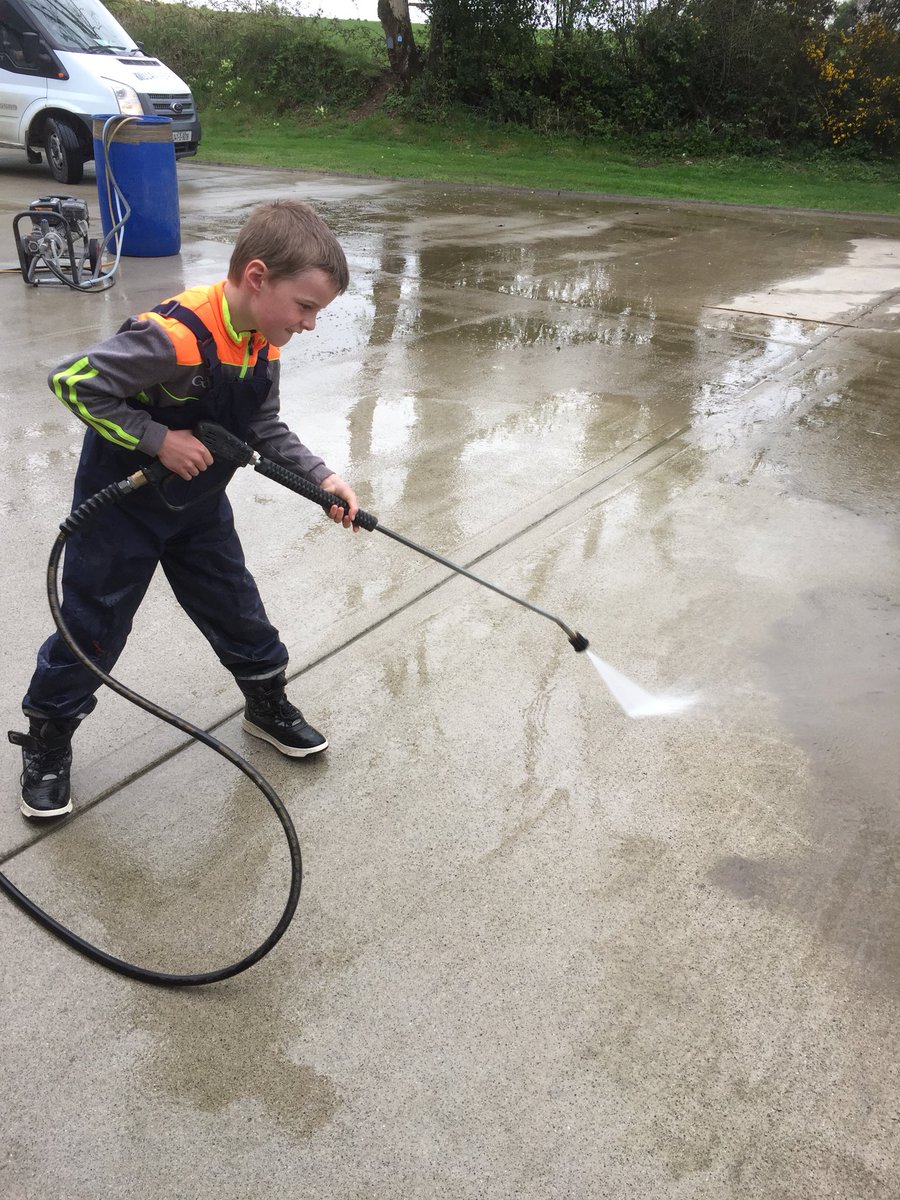 Jack and Evan busy boys power washing around the house 🙌 keeping busy 😃