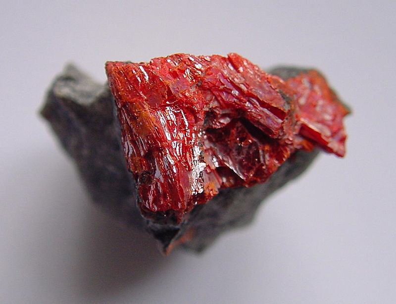  @aljawhara__at Getchellite is a rare sulfide of arsenic and antimony, that was discovered in 1963. Many metal sulfides are grey to black, but a few are brightly colored. This is one of them and it’s a bright orange red.