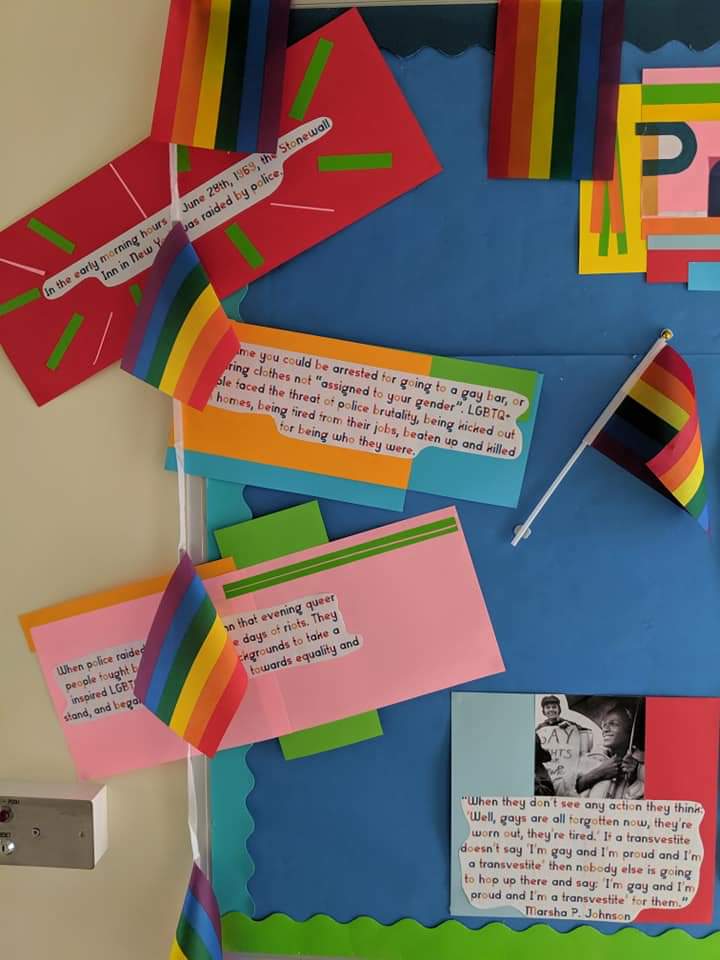 Teacher_Cameron's tweet photo. Some pictures of the Pride Month display I did at my school last year. 

I'm the LGBTQ+ &amp; Equalities Officer there, and we get plenty of LGBTQ+ young people come through our doors. I think being openly Gay gives them a lifeline, someone who will listen and support them. https://t.co/9jbxZsOeiH