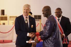Weah is the current president of Liberia and in 2018 presented Wenger with the highest award in Liberia - "Knight Grand High Commander of di Humane Order of African Redemption". a testament of the good relationship that exists between the two.