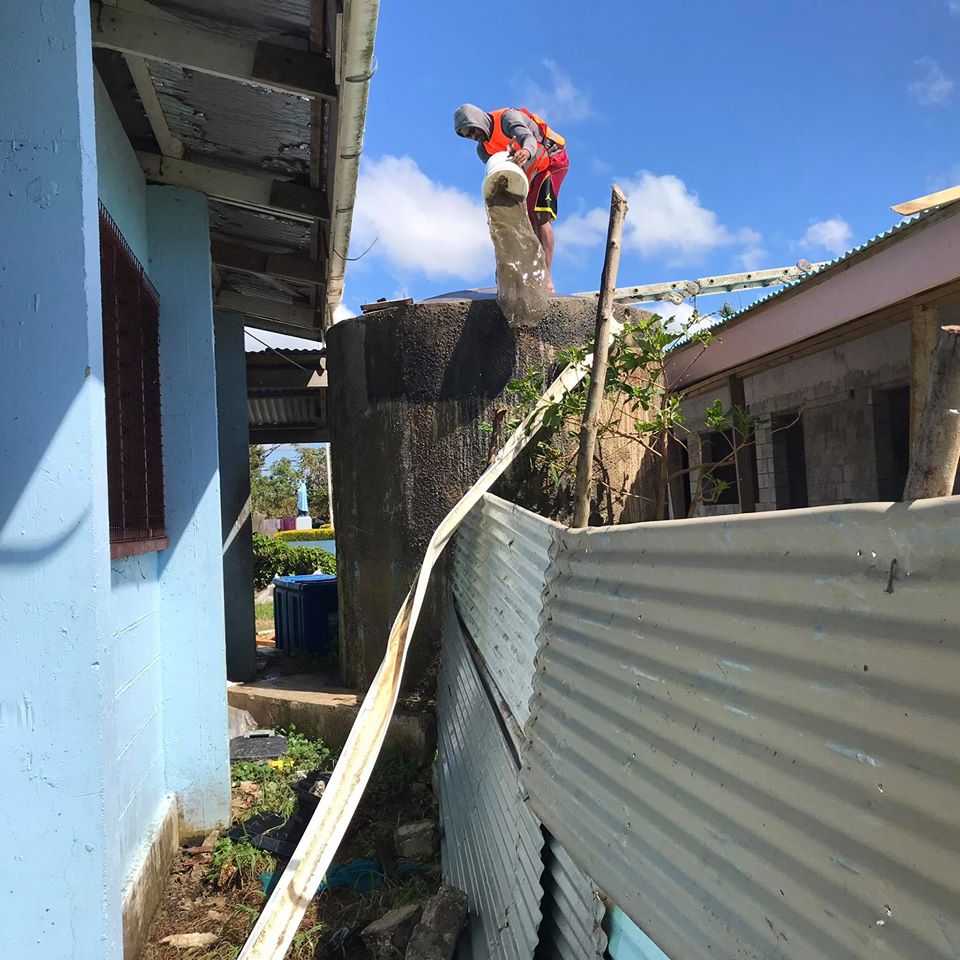 TnycTonga's tweet photo. @TnycTonga #waterpurification team #purifying water tank of schools in Tonga after TC Harold. @oxfamnz https://t.co/K0oD6GctBb