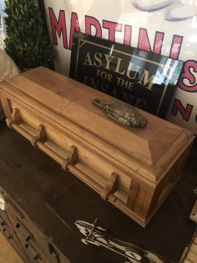 A salesman sample-size coffin. With a dead sock monkey in it.