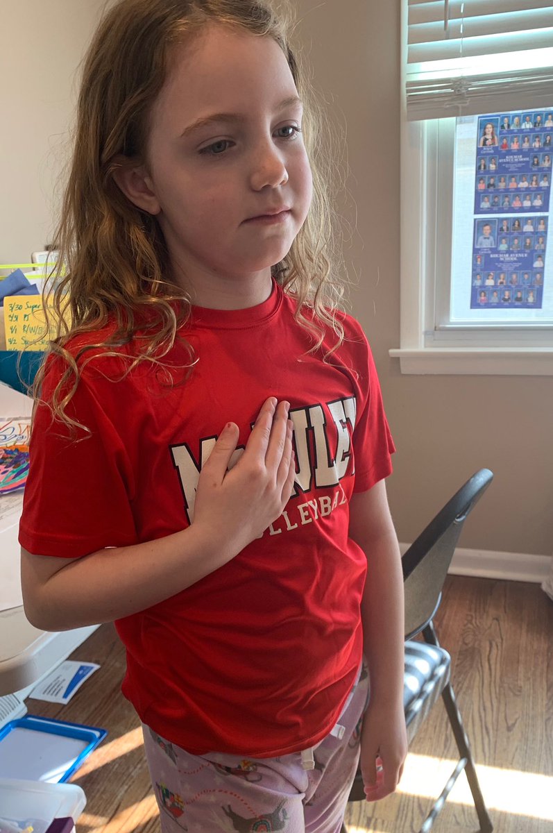 McAuleyMacs's tweet photo. 1st grader & Future Mighty Mac Brigid Carmody (daughter of @McAuley_VB Coach Kristyn Corley Carmody, Class of 2001) begins each day by praying & saying the Pledge with our Mighty Macs before she starts her school work! Thanks for joining us every morning, Brigid! #futuremac https://t.co/Vete1Xf2Hp