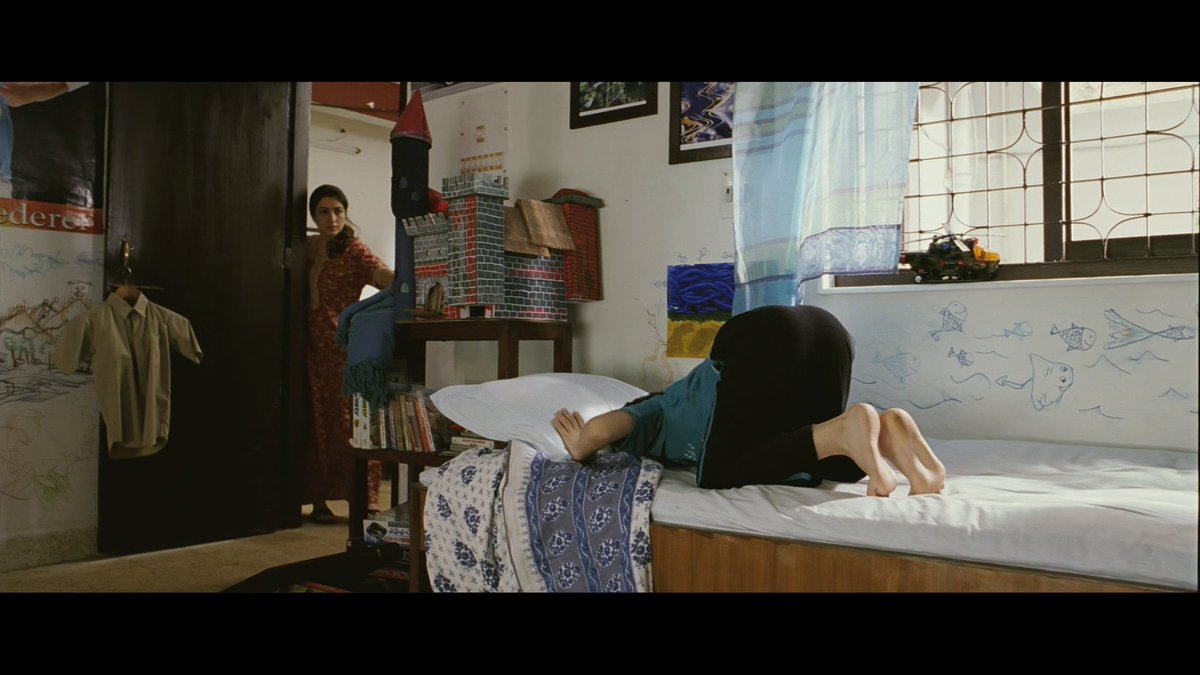 The shots move more leisurely when the scenario of Ishaan is shown. Then the mother comes and wakes up him, his world begins to progress rapidly like others in his family. Just to suggest how different is his world from the others. (2/2)