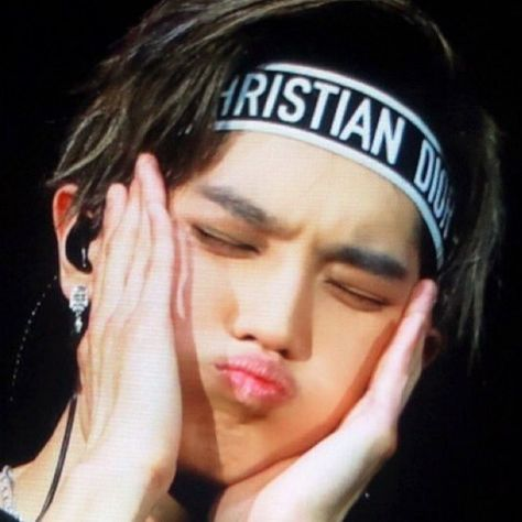 Taeyong the baby, making a kissy face