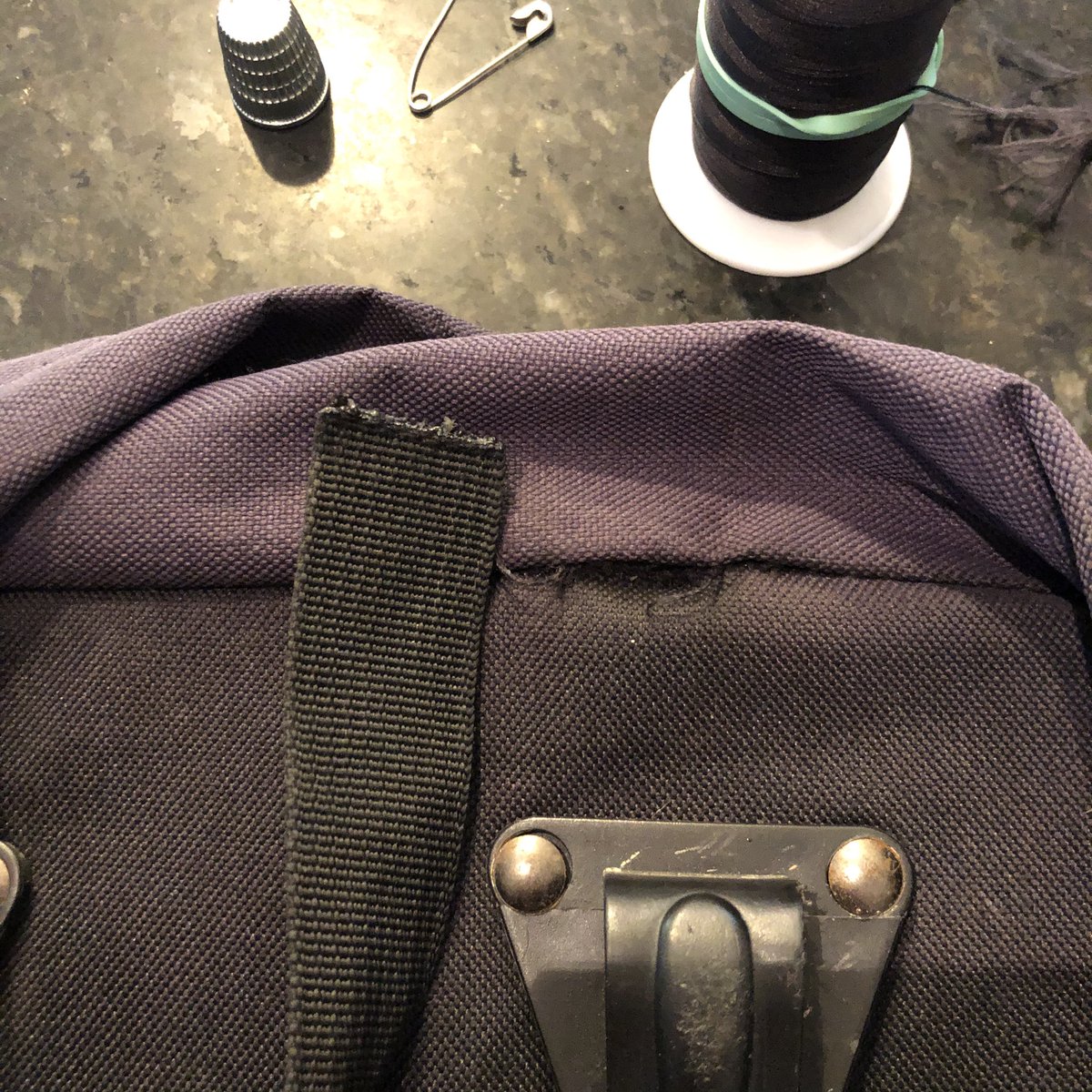 The last indignity was when the strap on one of the bags pulled out from the seam when I jerked too hard getting it off the bike. We are going to fix that problem tonight.