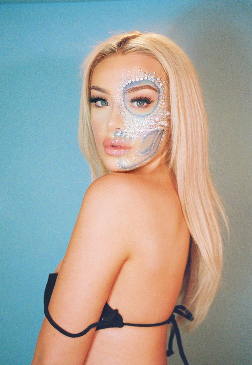 tanamongeau's tweet photo. here’s more film from the Without You cover shoot since it technically releases at midnight 🤍💙 https://t.co/v0JqqlTq6x