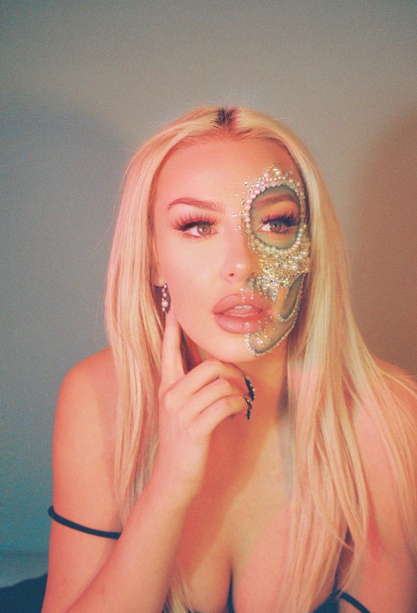 tanamongeau's tweet photo. here’s more film from the Without You cover shoot since it technically releases at midnight 🤍💙 https://t.co/v0JqqlTq6x