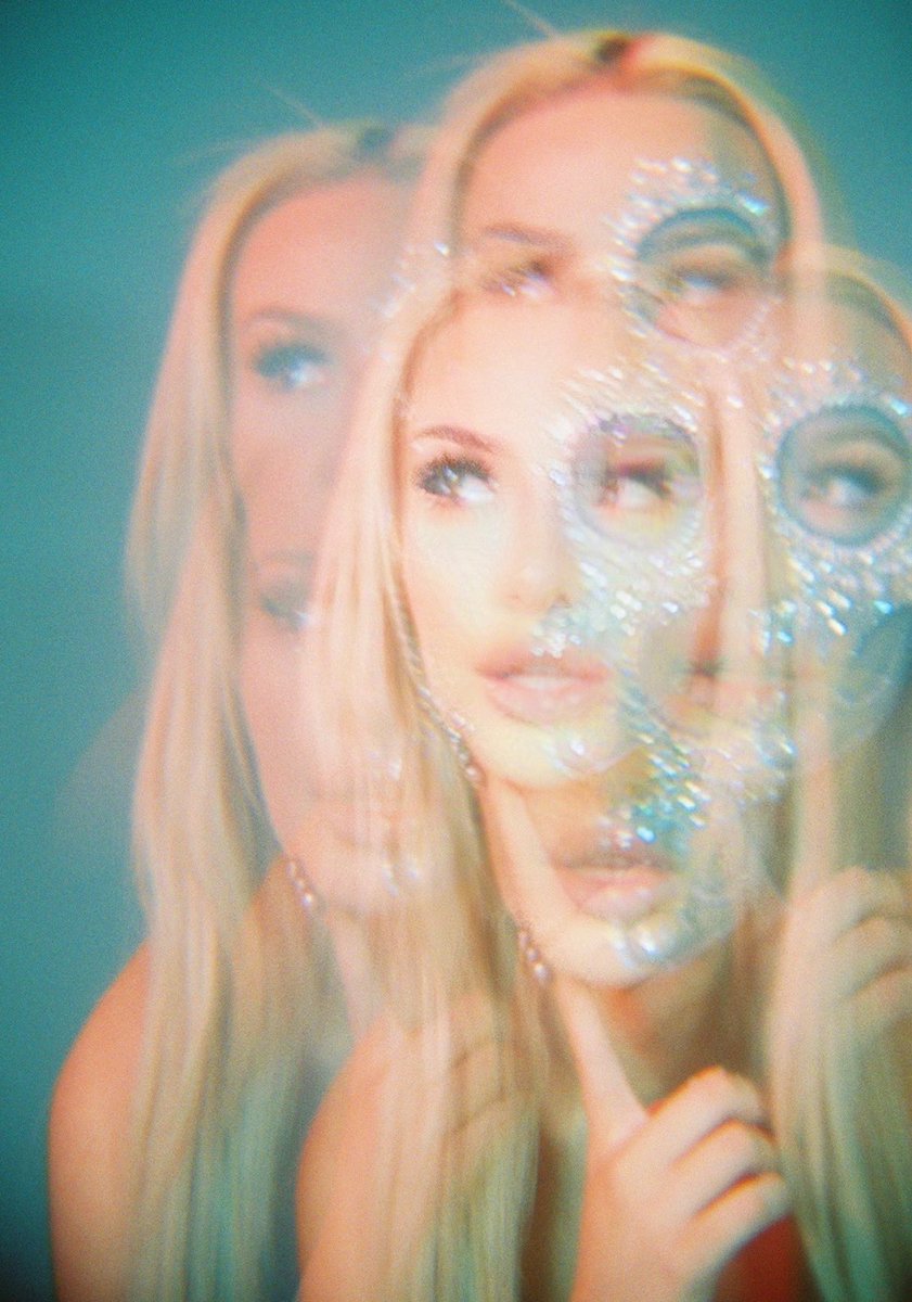 tanamongeau's tweet photo. here’s more film from the Without You cover shoot since it technically releases at midnight 🤍💙 https://t.co/v0JqqlTq6x