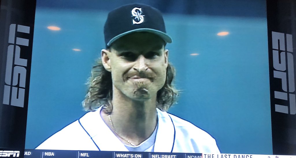 like on top of the height, the bonkers arm, the bird, this face...HIS NAME WAS RANDY JOHNSON