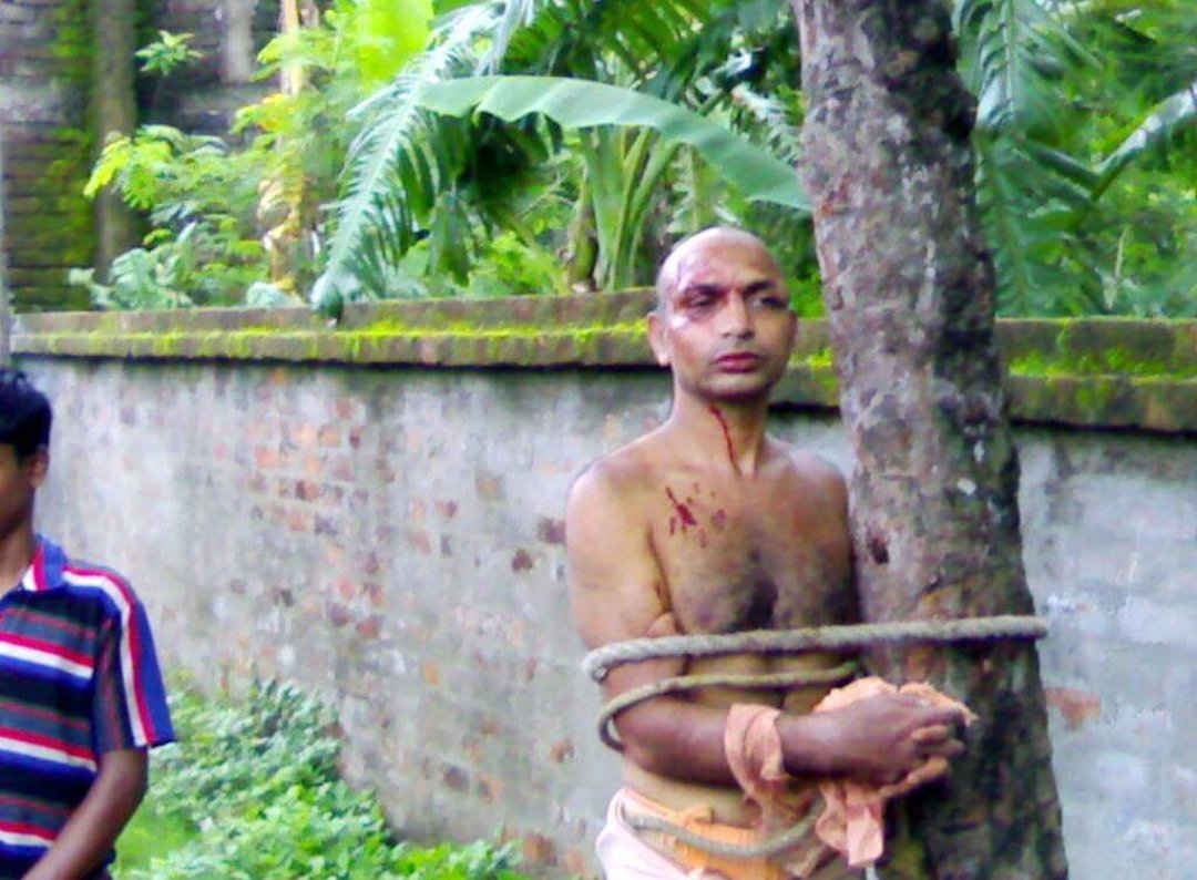 This is Swami Punyalokananda.

He was tied to tree &amp; beaten ruthlessly by CPI(M) Zlamist leader SK Ismail along with other 3000 Momim mob

Do you remember
Any outrage in media?
Any prime time debate?
Any newspaper headline?

Hindus have short memory, so thought of reminding you