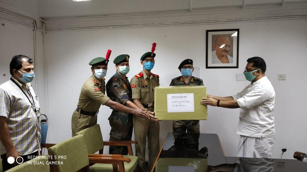 KeralaNcc's tweet photo. #NCC #COVID19 #ExYogdan  1  (Kerala) Girls Bn cadets  handing over 800 face masks  to Higher Edn Minister of Kerala       Dr KT Jaleel.@HQ_DG_NCC https://t.co/werRepOxqN https://t.co/cdGrYZaAeg