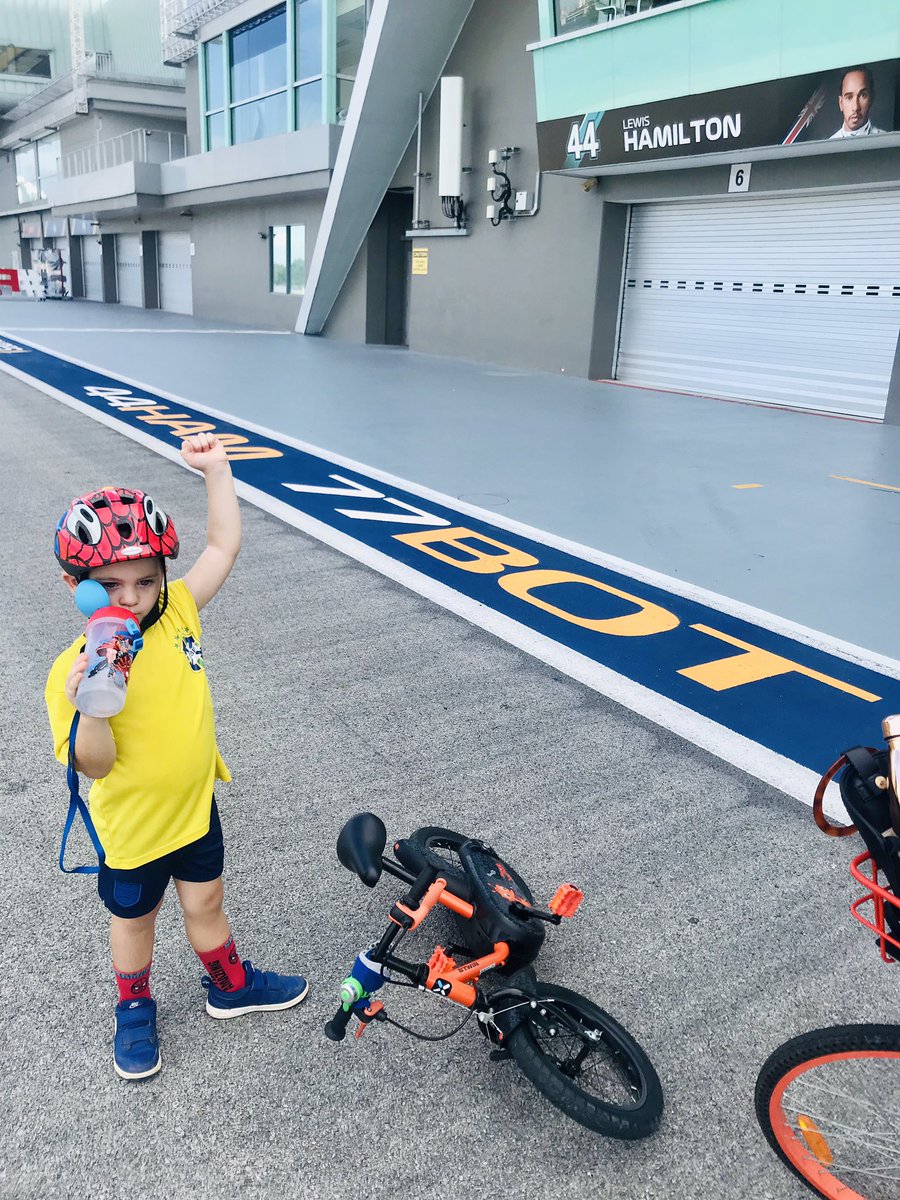 kbo81's tweet photo. Got the boy off the stabilisers today and what a better place to learn to ride on 2 wheels @F1NightRace @LewisHamilton https://t.co/sEkOkJT4x6