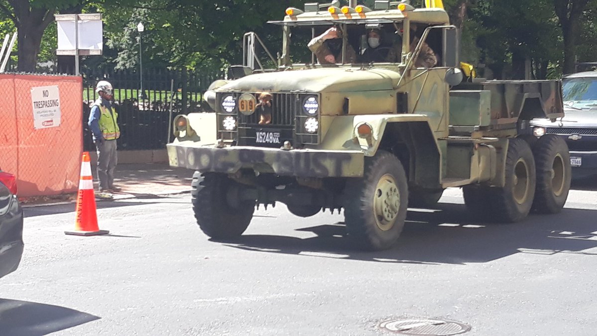 The bump on the military truck at this Reopen Virignia protest says "Boog or Bust"