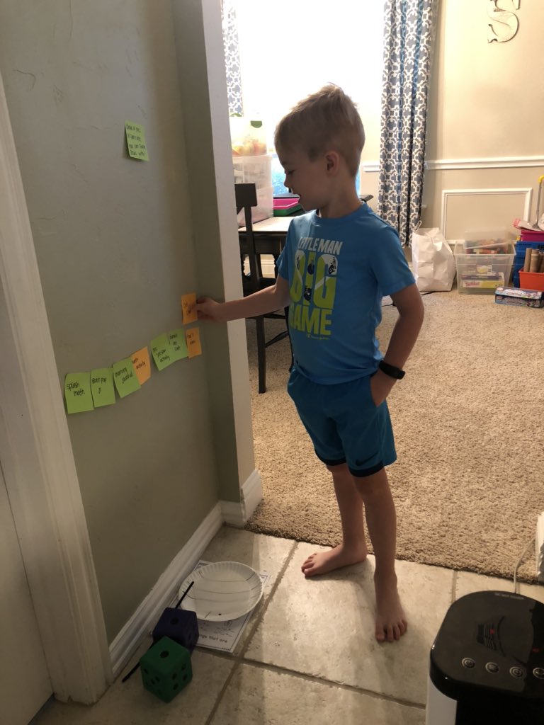 EscarboroughK's tweet photo. We found this system to work best for us here at home! All his school work activities for the day are on a post it note. He can do them in any order, and moves them to a different wall once completed. #kinderkid #responsiblelearning #choice https://t.co/dOjYaF1Xsn