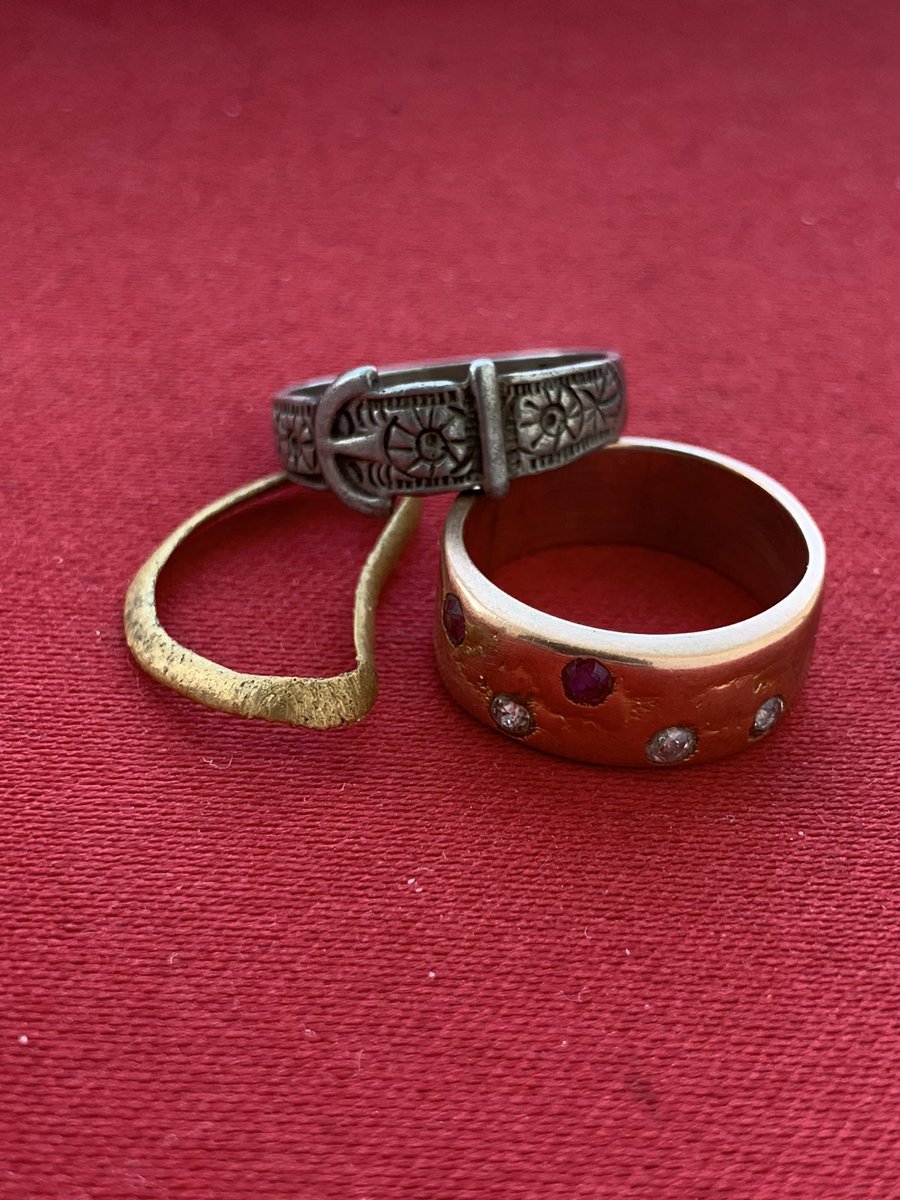 ..the two gold rings that I have been fortunate enough to find are both Victorian. The thin wedding band is 22ct gold & the second one is 9 ct gold. The silver buckle ring is also estimated to be Victorian, though no hallmarks are visible so it could possibly be later in date..