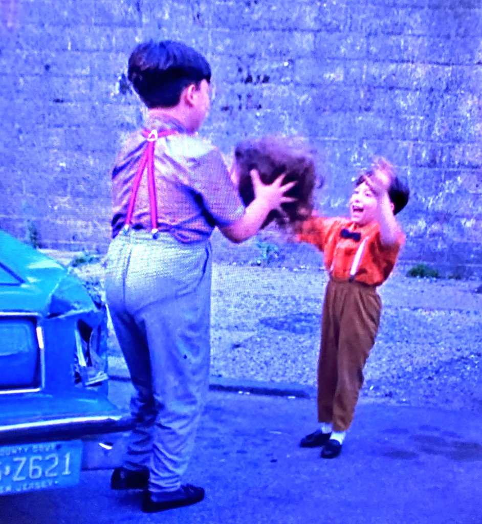 I'm not going to describe the next scene except to say that it ended with these two children playing catch with a freshly decapitated head.