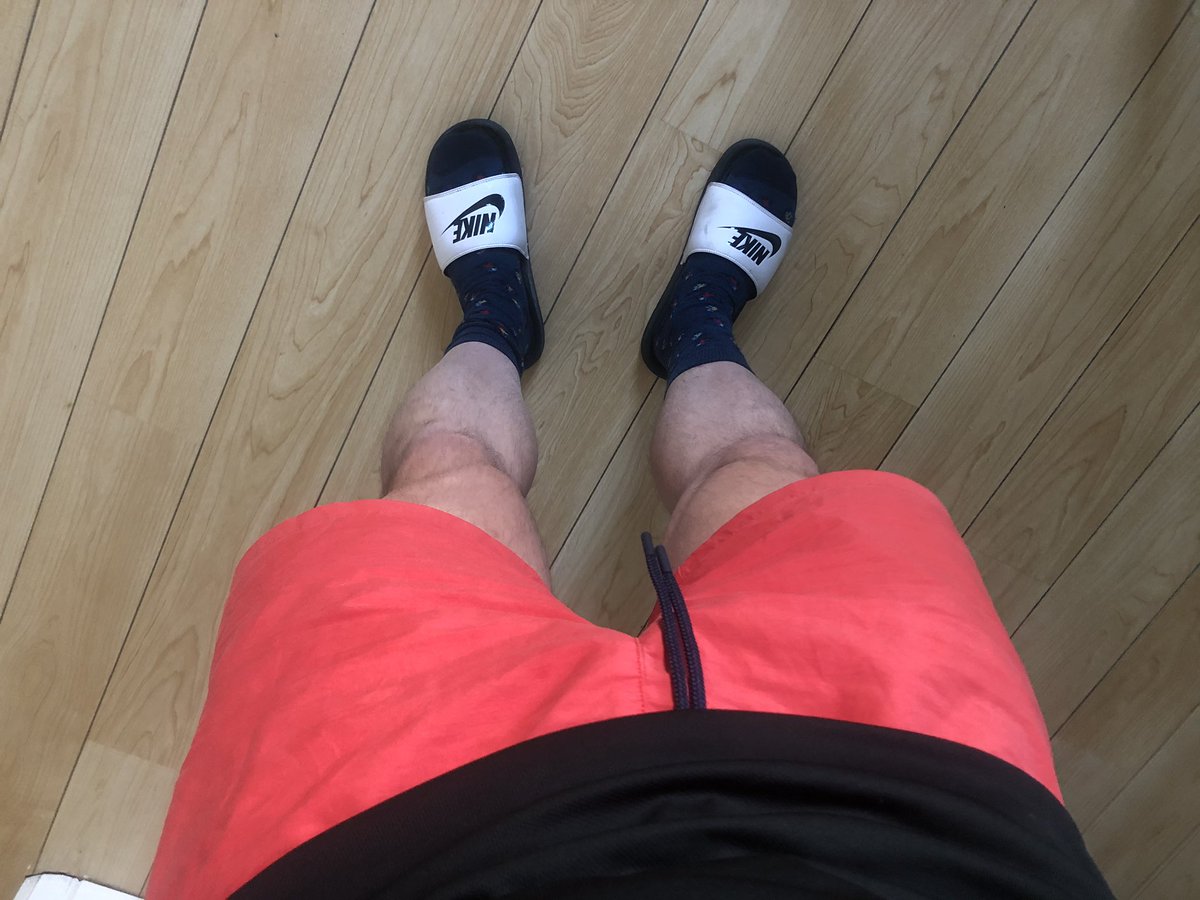 Top half smart.  Bottom half baywatch shorts, socks and sliders.  #wfh fashion.