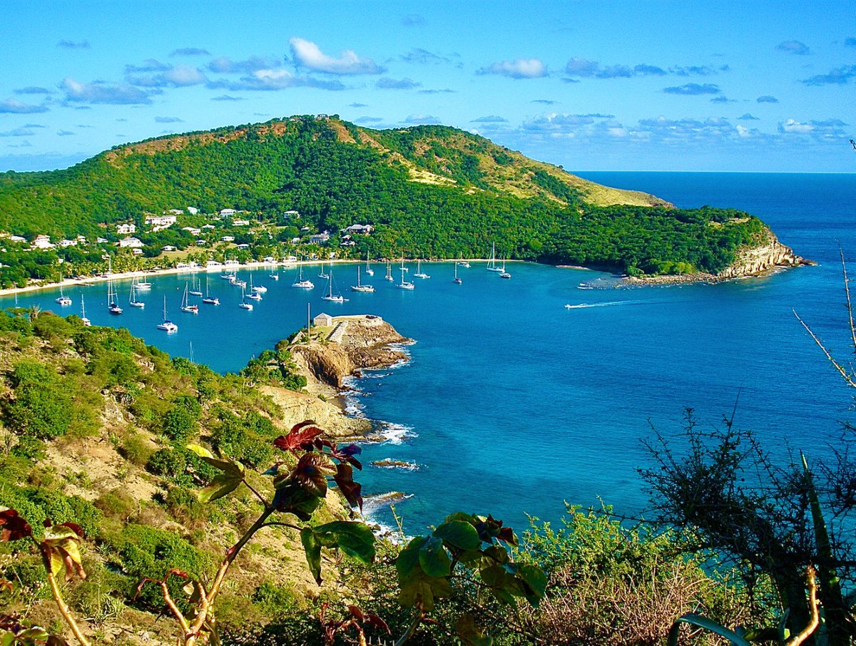 Continuing my alphabetical retrospective of islands: Antigua at English Harbour, taken from the “other side”.This shot shows the harbour entrance & Fort Berkeley. @antiguabarbuda #englishharbour #travelphotography #caribbean #nelsonsdockyard #caribbeandreaming #sailing