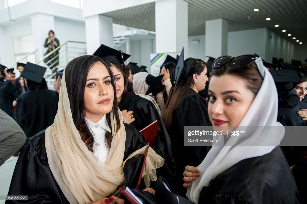 People of Kabul: Young girls celebrate their graduation at the American University of Kabul.Photo by Scott Peterson.