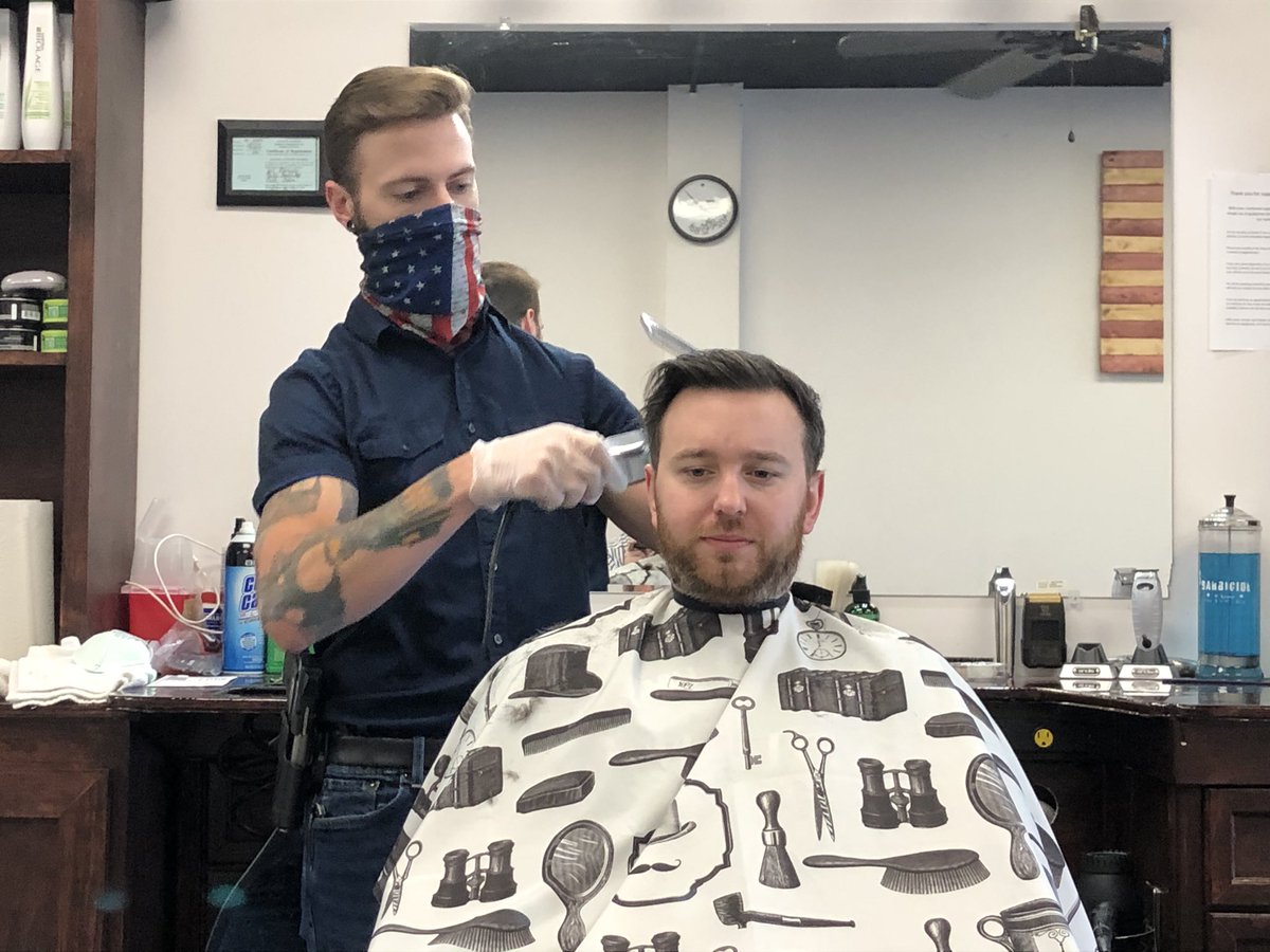 Charress's tweet photo. This barbershop in Mobile, Alabama, has reopened despite a cease and desist order and a $500 fine from police yesterday. At 9am on the second day, there are no cops here. Follow @aldotcom for more coverage. https://t.co/hfyveItFI8