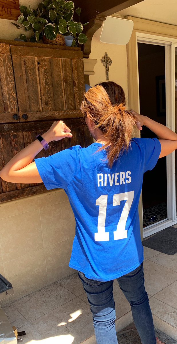 MarieCoronelSD's tweet photo. My husband’s first gift to me many years ago was a powdered blue Philip Rivers jersey. While I had to put that gear away, I’m loving my anniversary gift, a Rivers horseshoe blue shirt. Never thought I would be rockin @Colts gear but happy to cheer for #17 again. https://t.co/LGM6fzXSp6