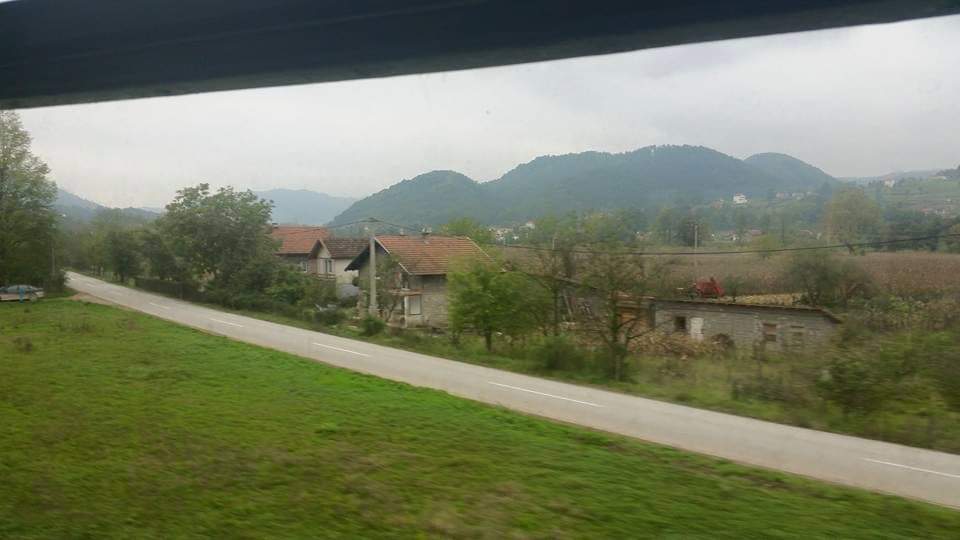 Going by land through what was, not that long before really, a warzone. From discarded tanks to buildings full of bullet holes, the reminders are everywhere. Just across the border, one of the Bosnian player's uncle got on and joined us, telling us what happened in the area.