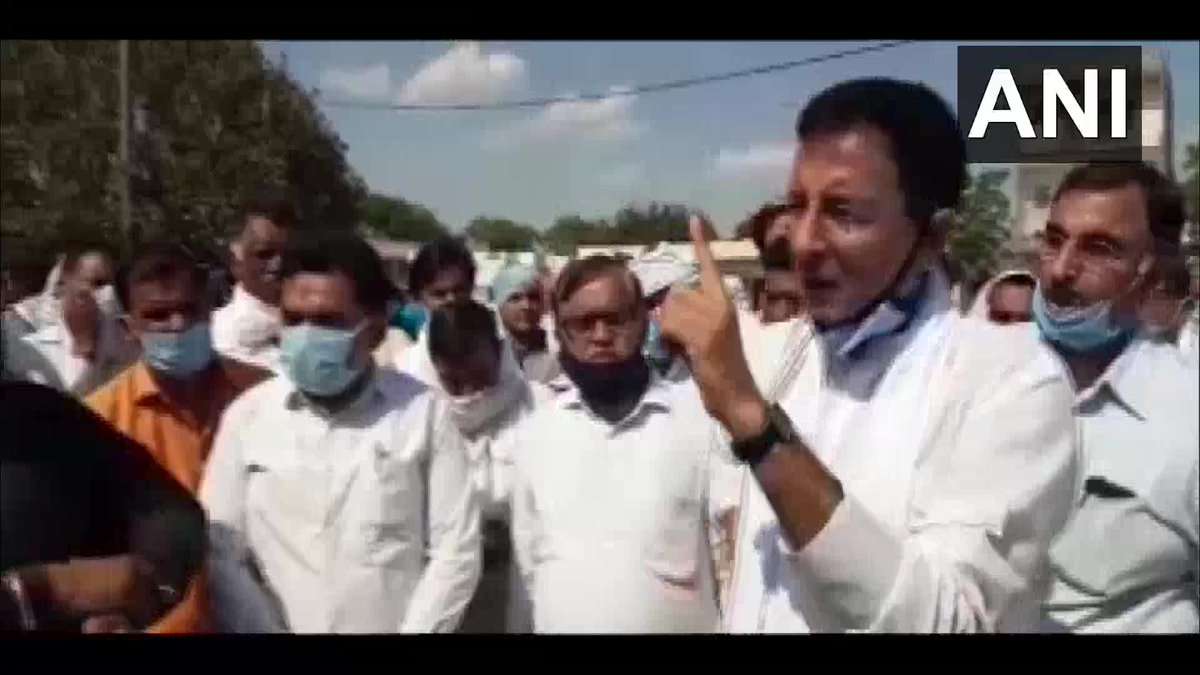 Congress leader Randeep Surjewala was seen addressing farmers at Haryana's Jind Anaj Mandi today, amid COVID19 lockdown