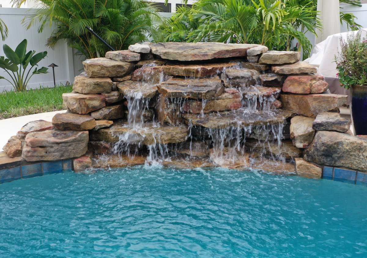 AtlasPoolsCF's tweet photo. Nothing compares to the soothing sound of trickling water. Invite serenity into your #backyard with a custom #waterfeature. https://t.co/UYOqahJb1t