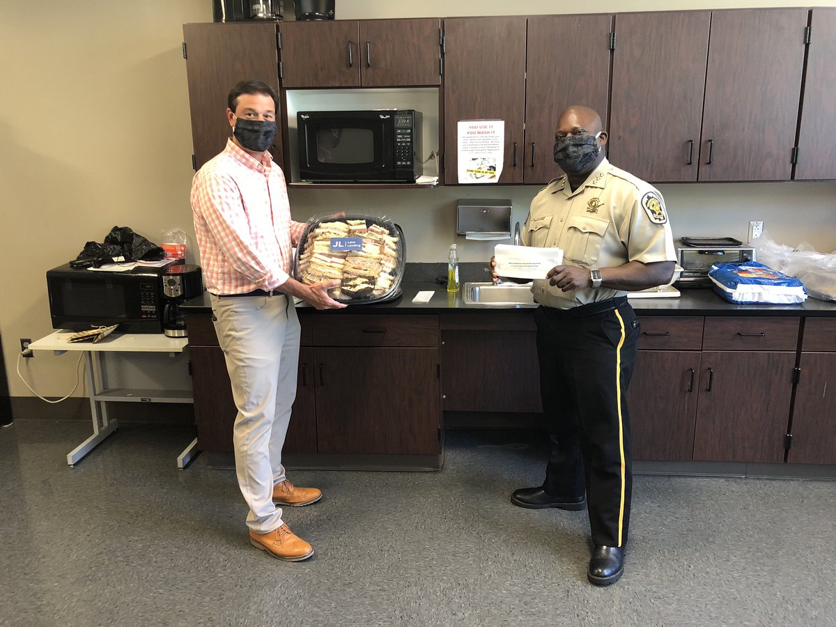 DougDistrict5's tweet photo. Jim Lane of the Lane Group provided lunch for the Sheriffs Department. In addition he provided all the deputies with a $10 gift card. Ashley Aaron from the Lane group is pictured with Sheriff Cunningham. #mymgmcounty https://t.co/cPniQ7zaF9