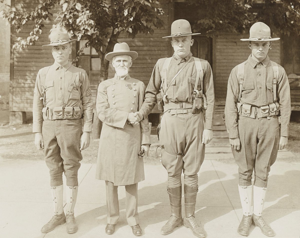 TMFMuseum's tweet photo. We found this image in the National Archives collection taken on April 11, 1918. The caption reads: Aged confederate soldier greets soldiers of the 36th Division on day of review in Fort Worth, Texas" #Texas #WWI #TexasHistory #WaybackWednesday #WednesdayThoughts #TexasMilitary https://t.co/EjYvCjgqwr