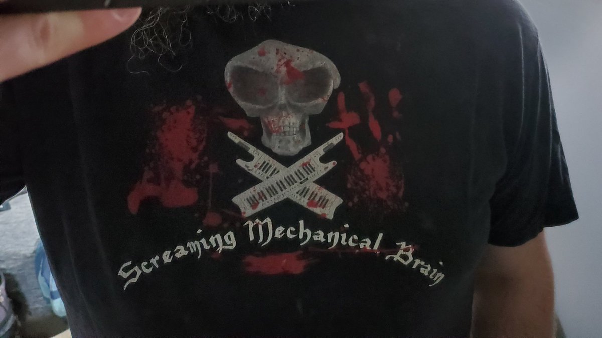 The 34th band shirt is from the industrial scene of Minnesota. Screaming Mechanical Brain, and yes they did have a keytar.