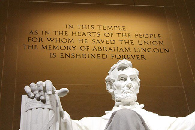 The Lincoln Memorial is referred to literally as a temple on the main inscription above the statue. It is modeled off of the temple of Zeus. It originally was to be modeled off of various other types of pagan temples, whether it be pyramids or ziggurats.