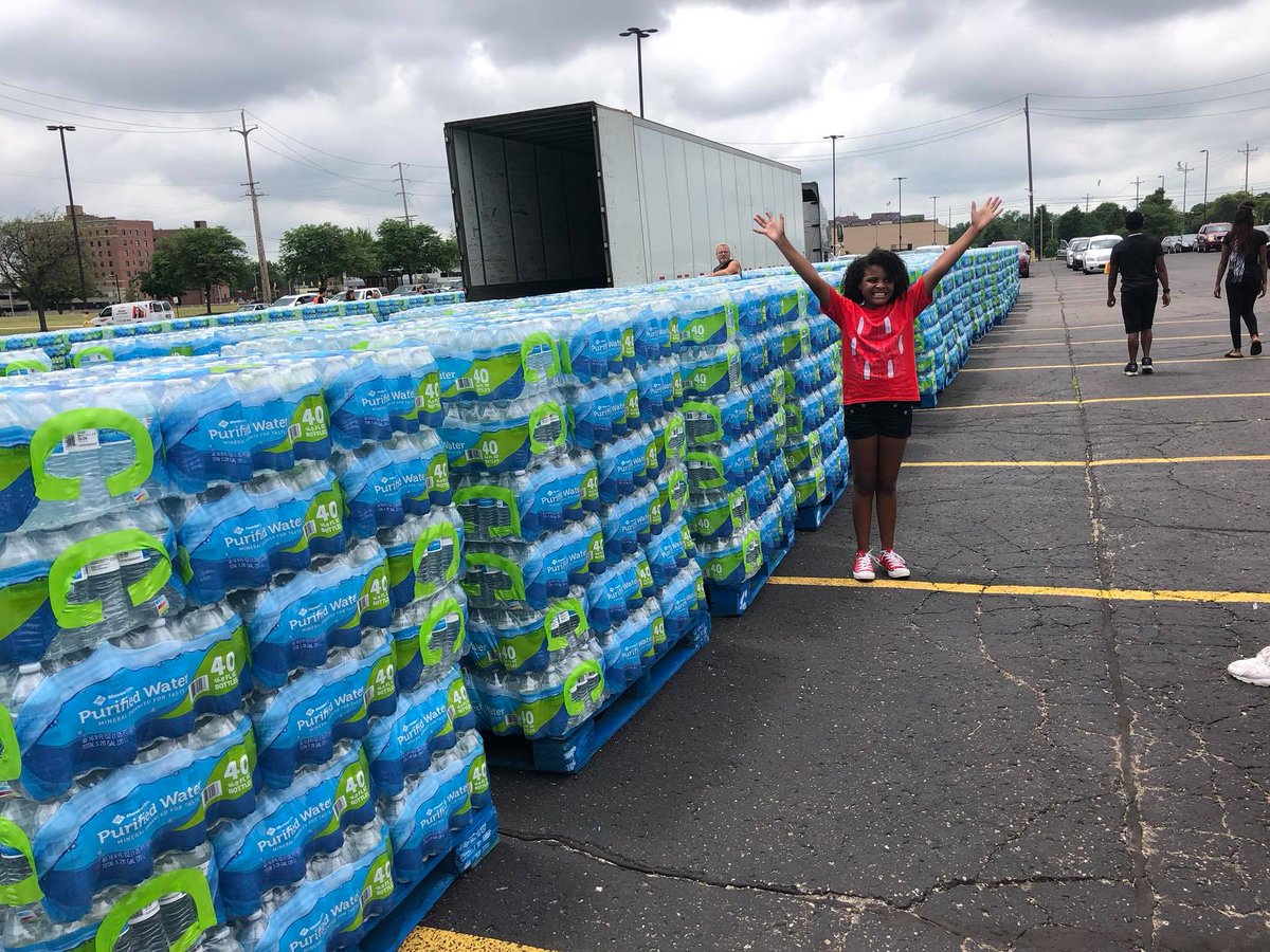 (14)Within 2 weeks we had raised $15k to purchase bottled water for my community. We took bottled water door to door on earth day 2018 and then started doing huge monthly water distributions. People would line up HOURS early to make sure they could get bottled water.