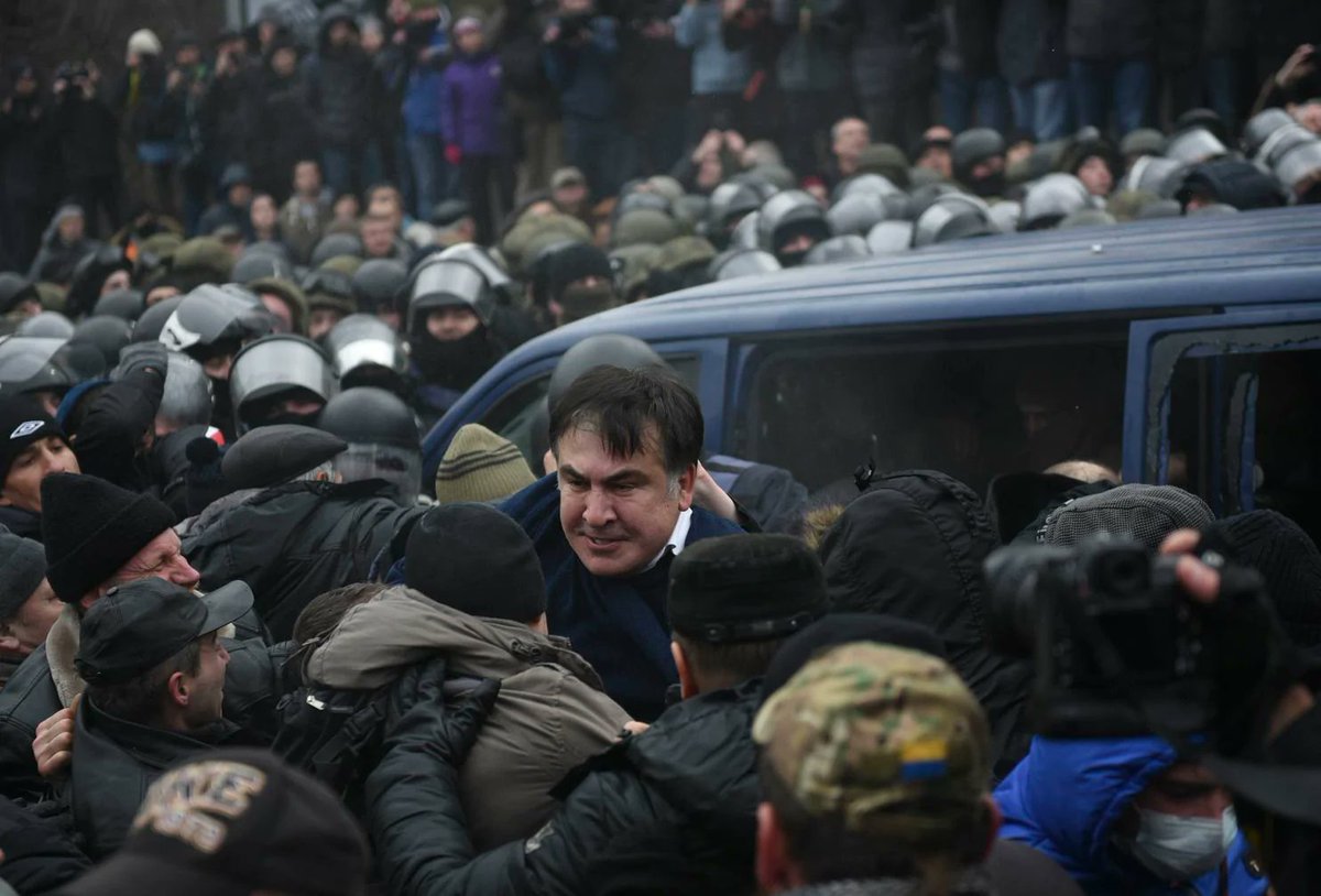 Forms his own political party, and starts attacking Poroshenko. Poroshenko retaliates by stripping his citizenship. Gives a rousing anti-Poroshenko speech from a rooftop in Kyiv. Is arrested, but his supporters clash w/ police and free him ( https://www.reuters.com/article/us-ukraine-saakashvili/supporters-free-ex-georgian-leader-saakashvili-from-ukrainian-police-amid-chaotic-scenes-idUSKBN1DZ0VU) ---7/10---