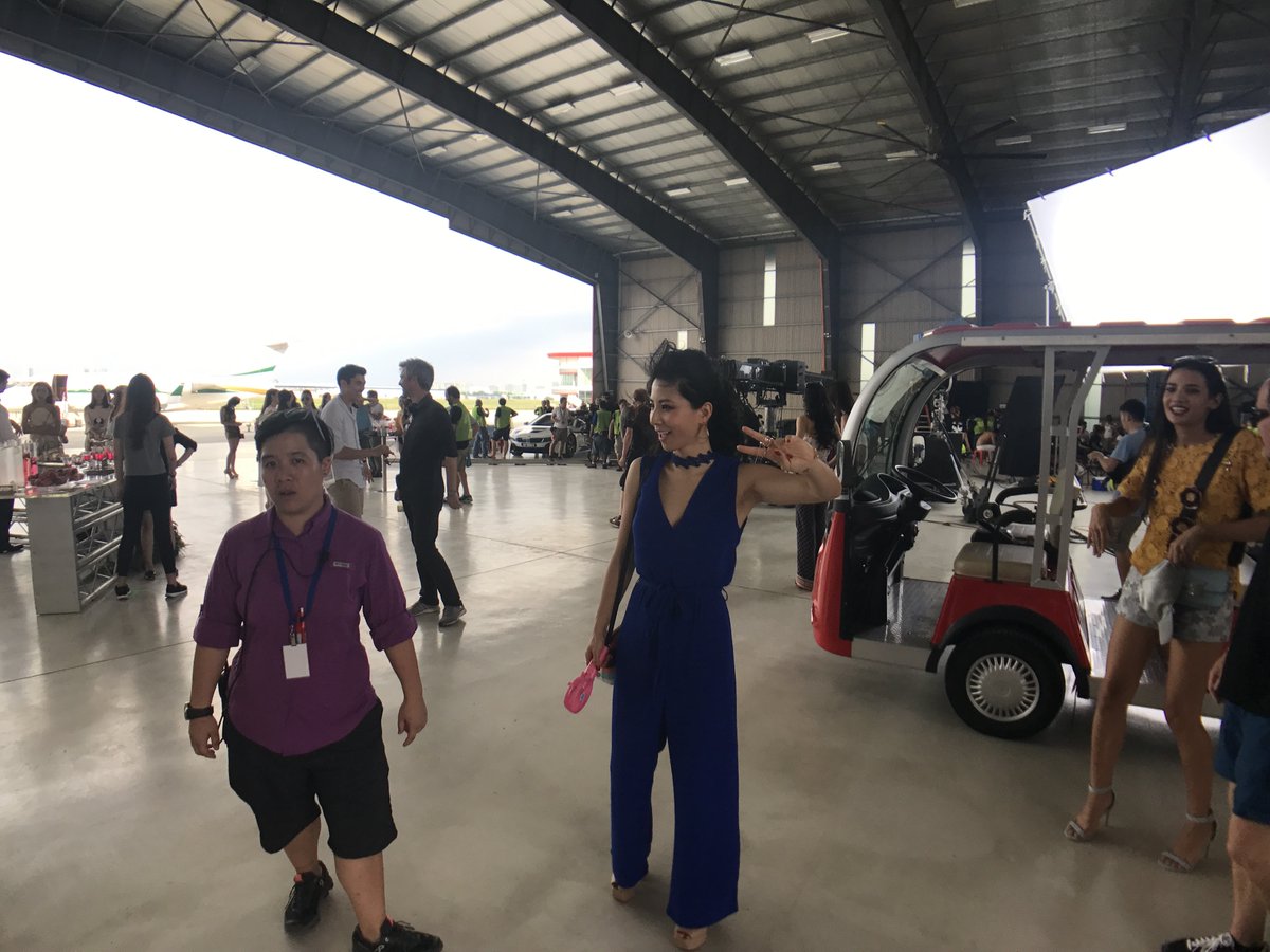 Behind the scenes at the airplane hangar scene. Constance Lau in front of the private jet. Lusi Jing and one of our great ADs Pikky Lim who really took care of the whole cast in some sometimes tough filming conditions.  #CrazyRichAsiansParty