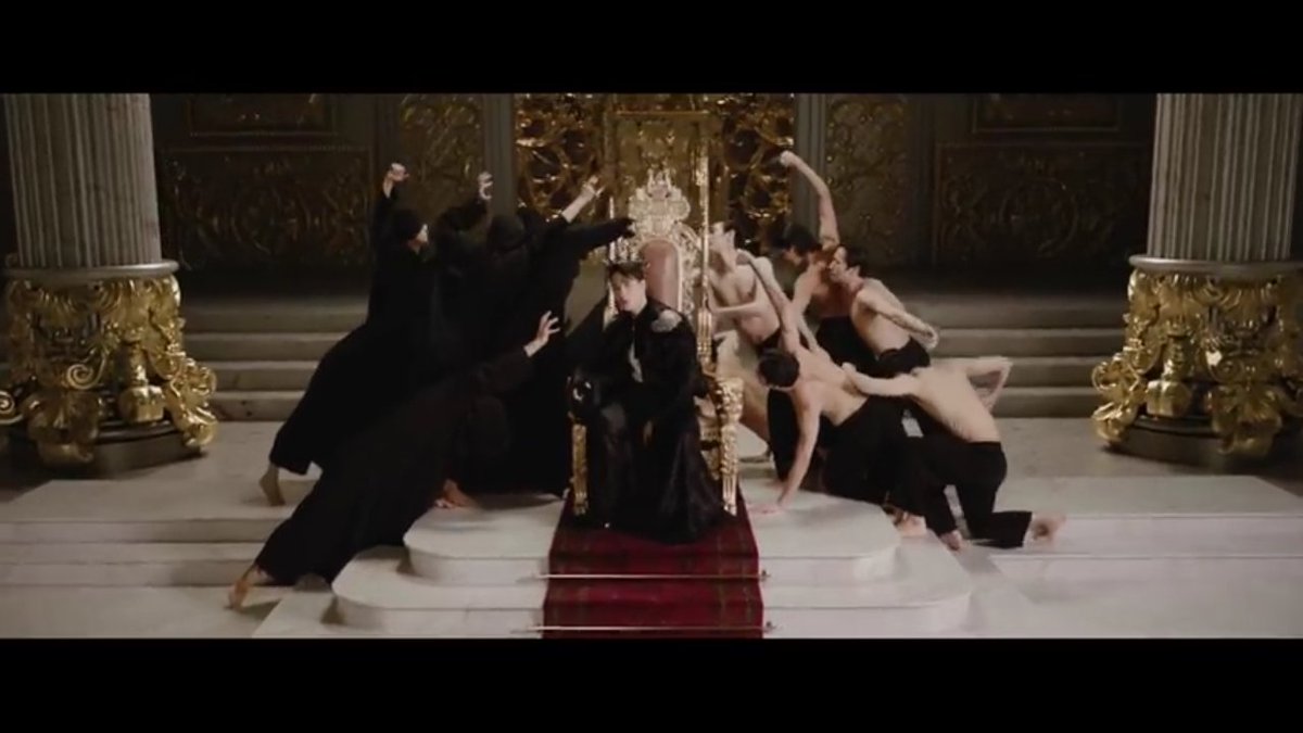 ThroneJackson*he was struggling with his decisions, represented by the black-shirted men on right and half-naked men on left of the throne, trying to grab the throne while he was sitting on it. @GOT7Official  #GOT7  
