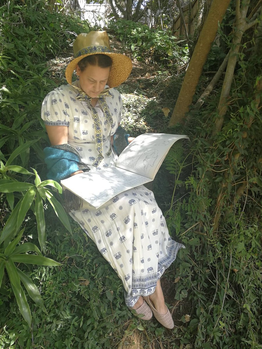 Here is digitisation assistant Lucy recreating the traditional 'lady reading a book under a tree' portrait with her favourite fashion history book (and it's actually a UQ library copy!)  #WorldBookDay 10/