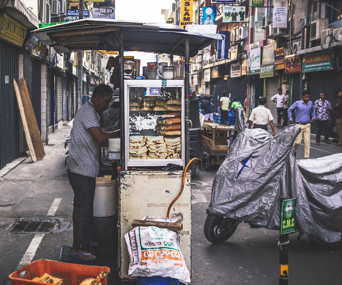 S_MorningLight's tweet photo. BREAKFAST KIOSK, #KEYZERSTREET, #PETTAH
Opinion on the #lockdownsl is divided and, predictably, it is divided most often along economic class lines; but also along political lines.
#streetsofcolombo #lifeincolombo #coronavirus #covid_19 #canonsrilanka #colombo #srilanka https://t.co/YBRqIA7HW5